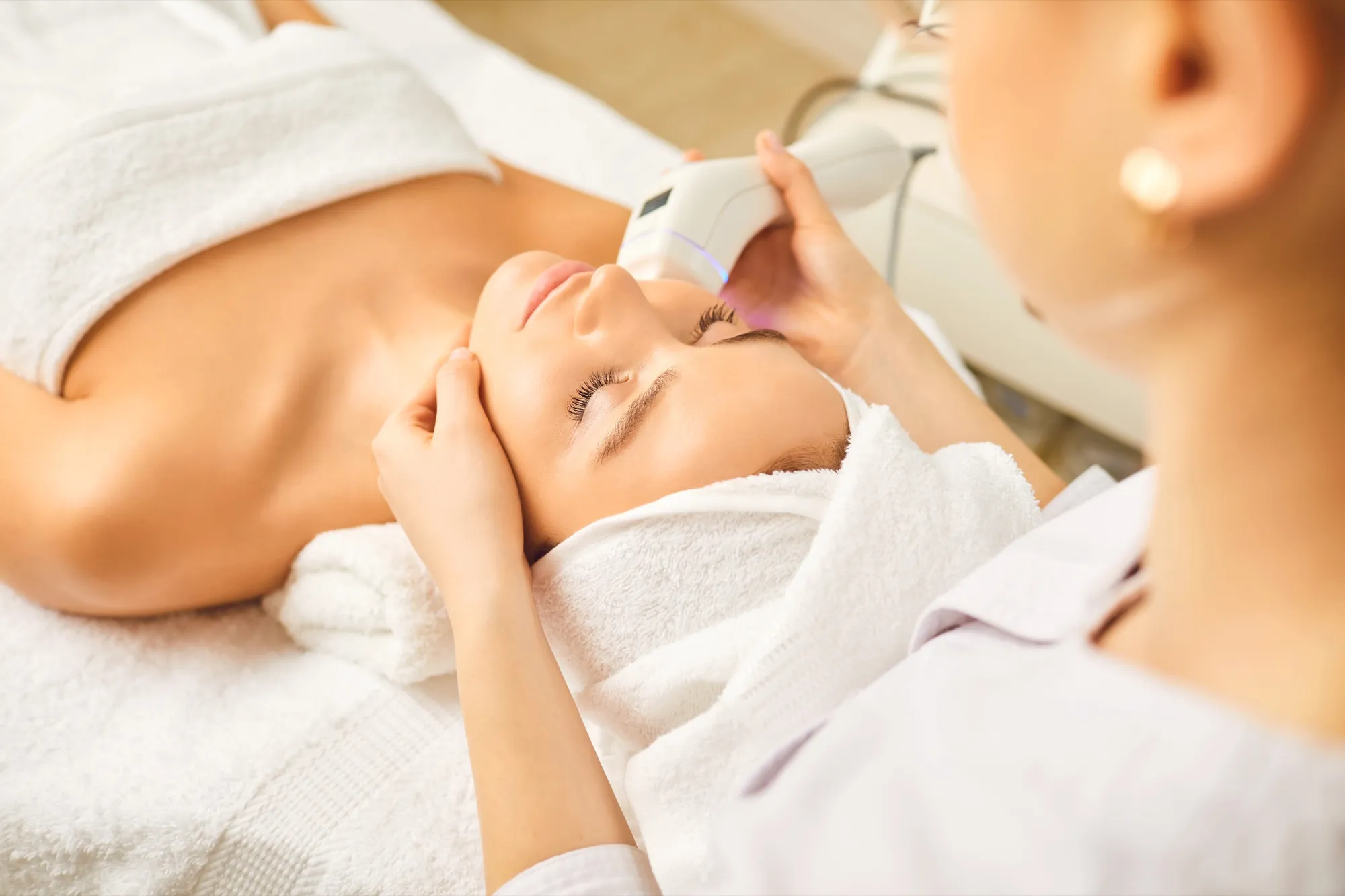 Client receiving a relaxing facial skin treatment at Bella Vita Aesthetics & Wellness